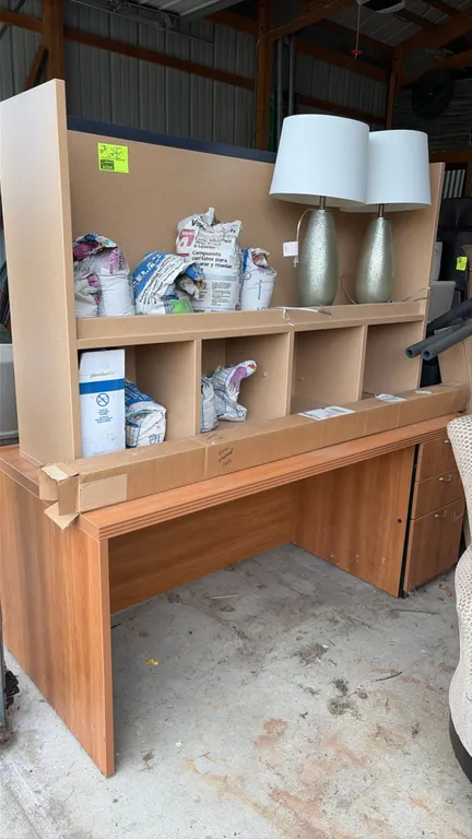 Wood laminate desk package lot. Includes a wood laminate single-pedestal desk with 2 drawers, an open multi-cubby hutch organizer, (2) matching table