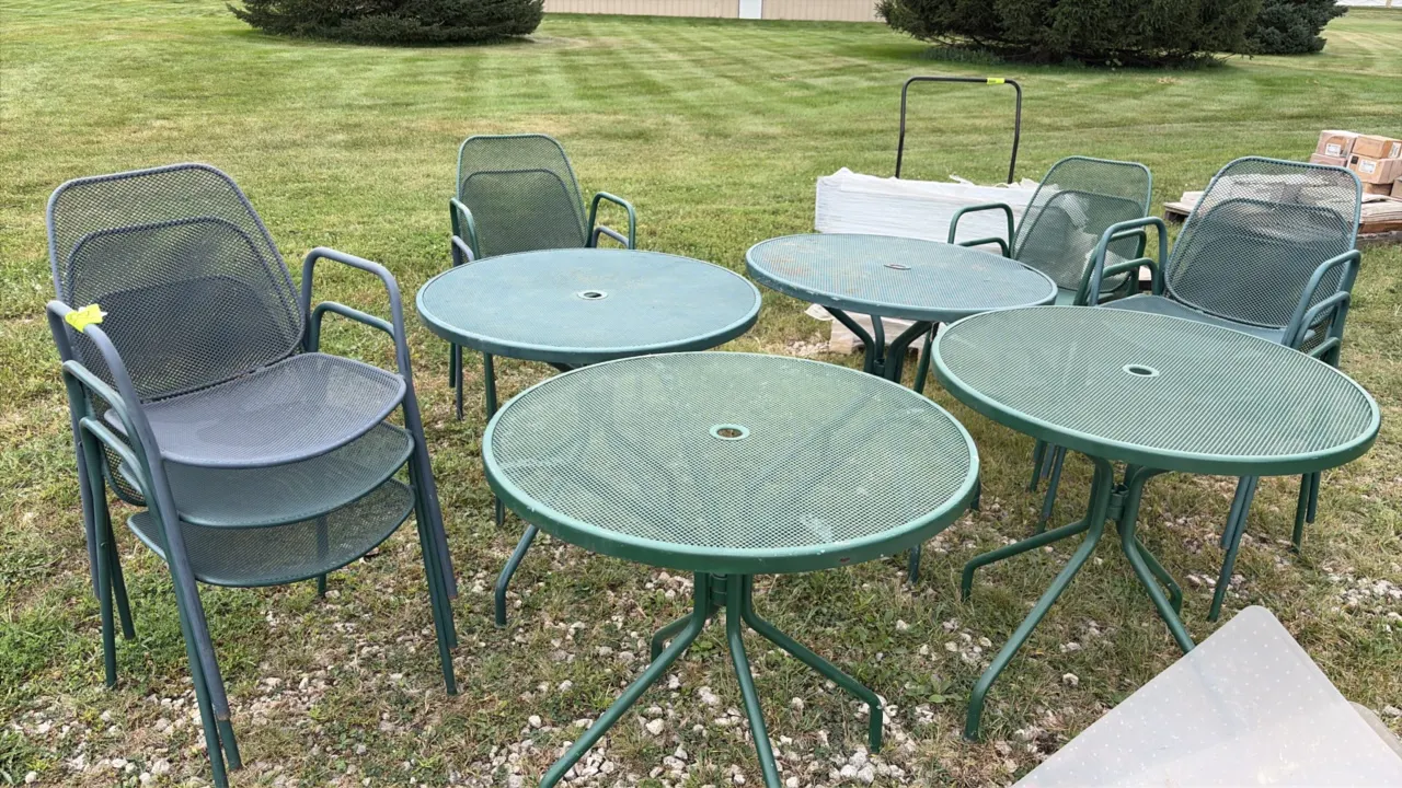 Patio furniture set. Includes (4) round metal tables and (10) metal armchairs. Features green expanded mesh surfaces and tubular metal frames. Tables