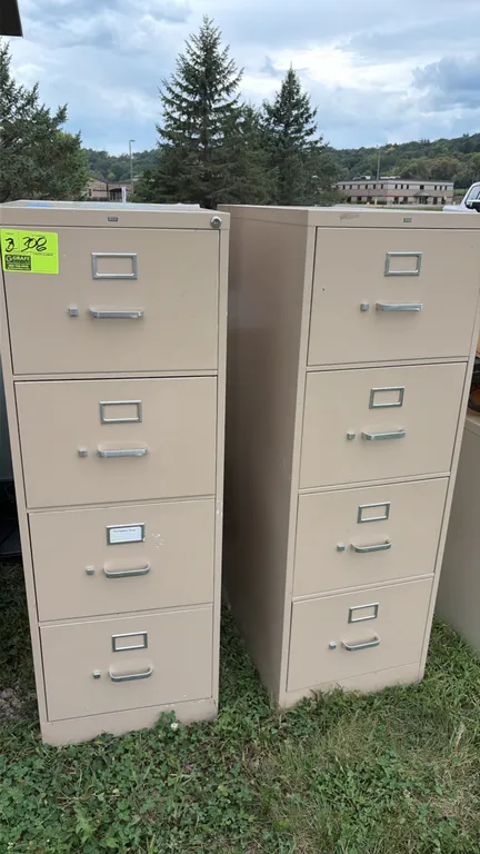 HON metal file cabinets. Includes (2) 4-drawer and (1) 2-drawer vertical file cabinets. Features aluminum pull handles, integrated label holders, and
