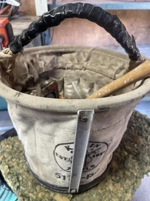 Klein Tools bucket with some wrenches, hammers