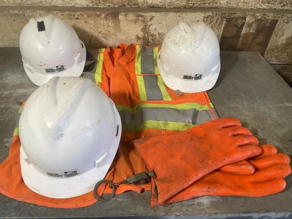 Safety gear. Includes three hard hats, hi-viz