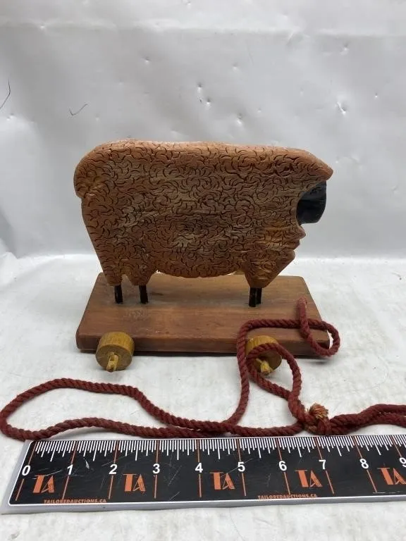 Folk art wood pull toy sheep