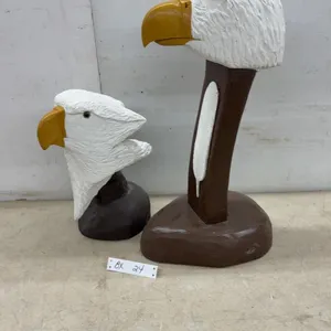 Two Hand-Carved Wooden Bald Eagle Head Sculptures on Pedestals, 14” and 22 1/2” by Local Artist