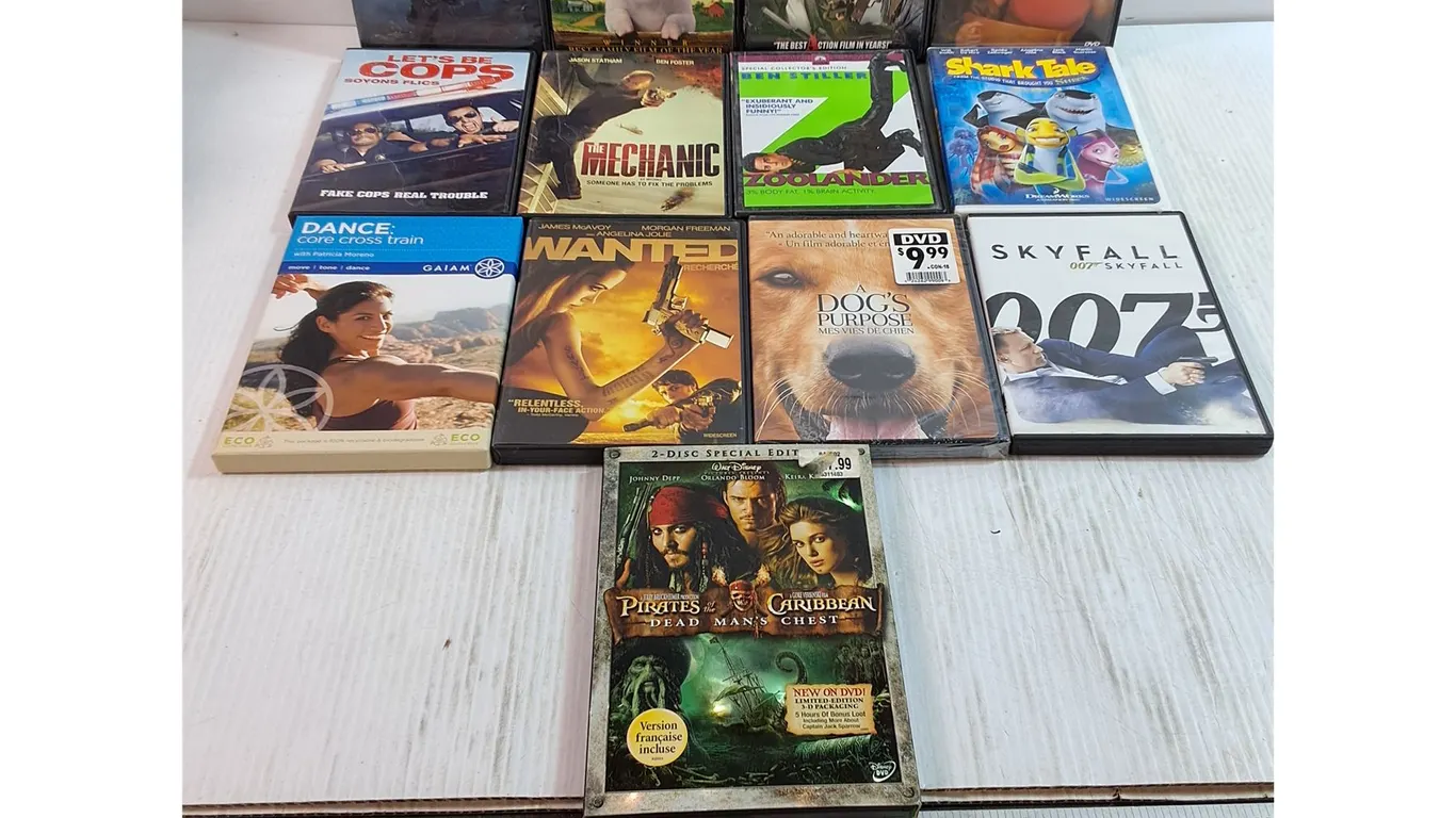 (13) Movie DVDs - Pirates of the Caribbean, Charlotte's Web, Zoolander