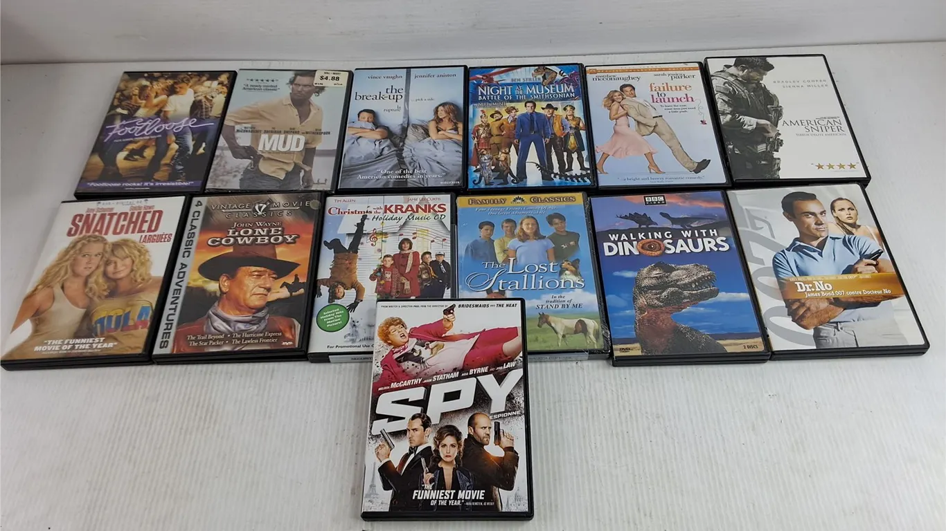 Assorted DVD Movies - Lone Cowboy, Walking with Dinosaurs, Spy, Misc