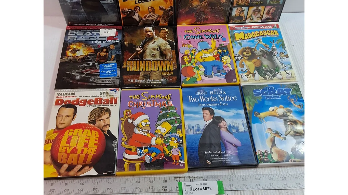 (12) Movie DVDs - Madagascar, Simpsons, The Dark Knight Rises