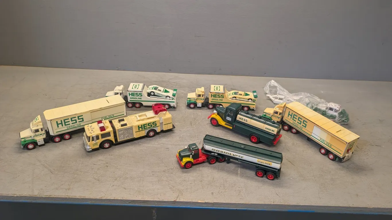 (8) Assorted Collectible Hess Trucks