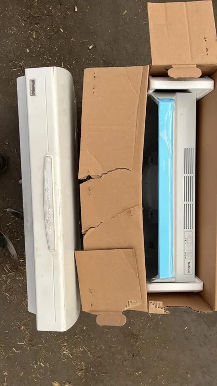 OFFSITE - 2 range hoods, 1 new without fan and motor 24”. and 1 used 30” that was working when removed.