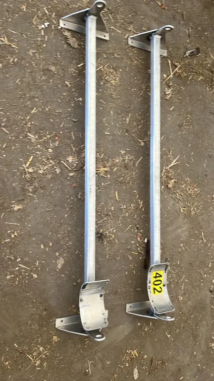 OFFSITE - Aluminum vehicle roof rack for carrying pipe.