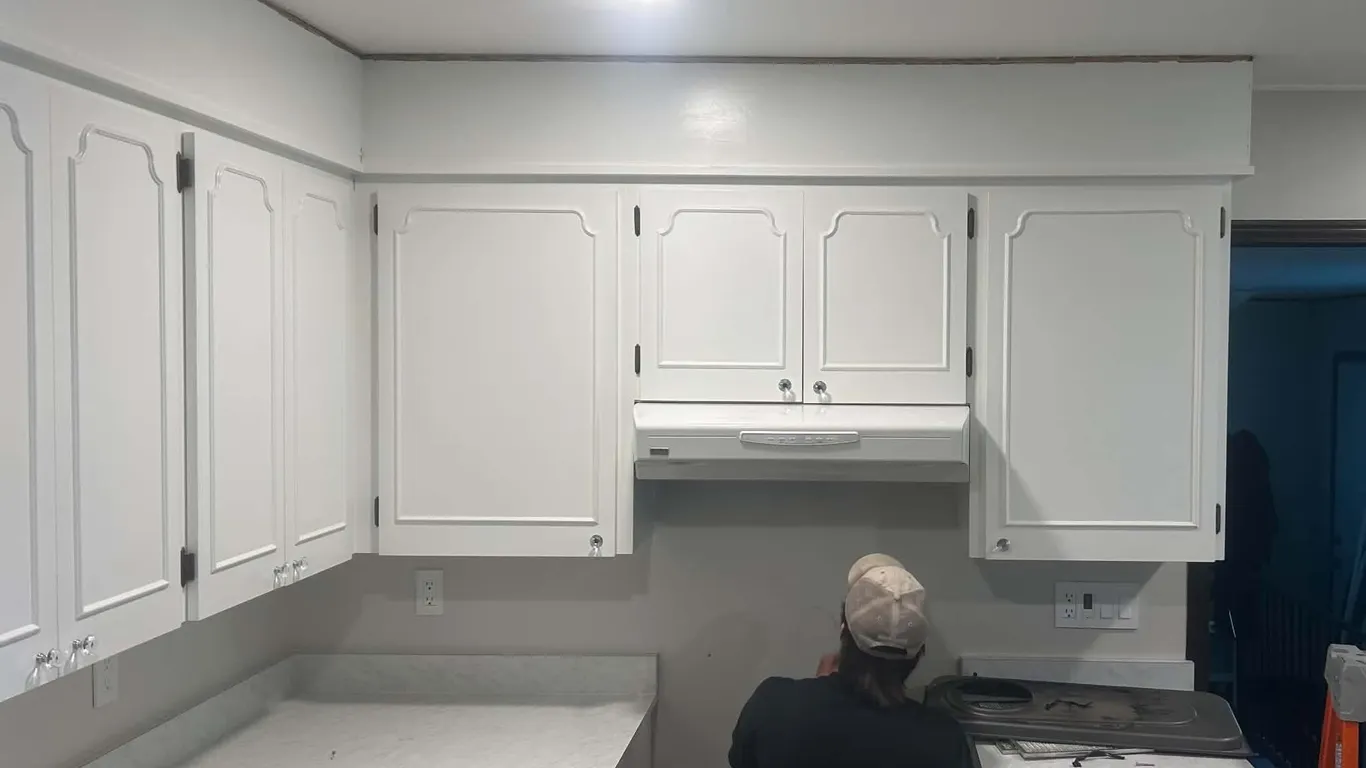 OFFSITE - 11 piece kitchen cupboard set plus countertops lazy Susan and double sink. Could be used for kitchen, garage or workshop.