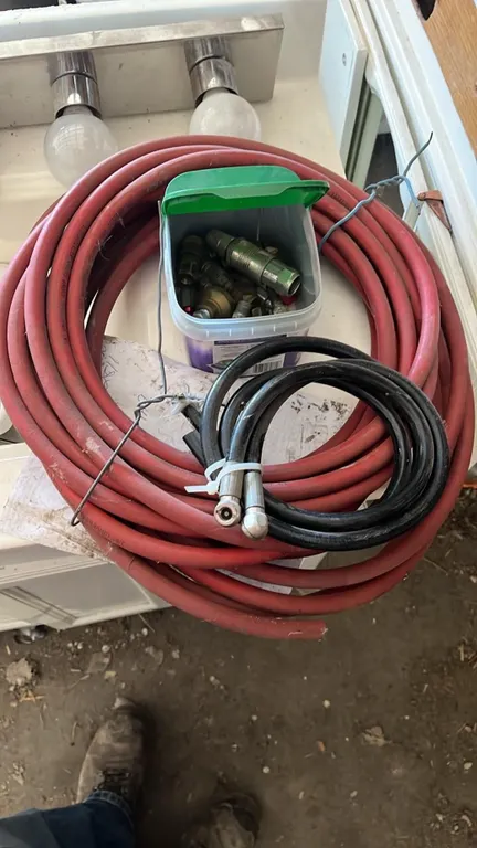 OFFSITE - Approximately 50 feet of air hose and fittings.