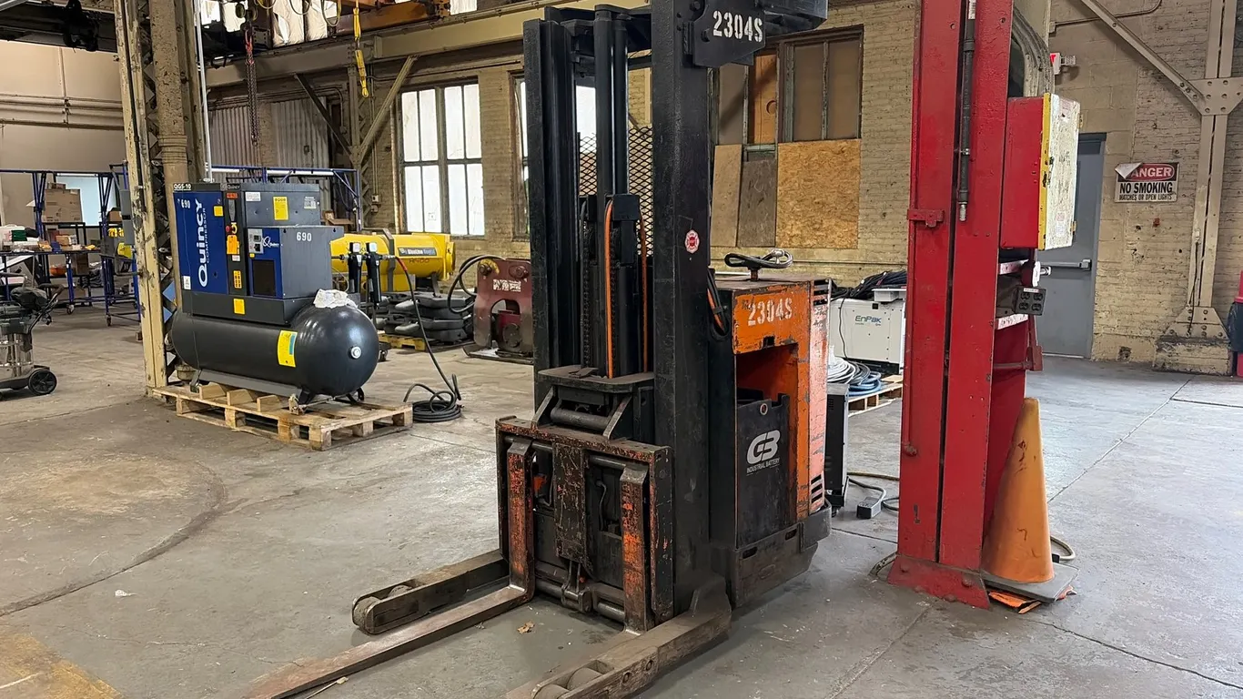 Raymond Stand-Up Reach Forklift with Extreme Power Battery Charger