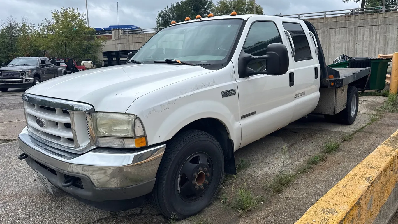 2002 Ford F350 Super Duty Diesel Flatbed Truck (Title in Delay)