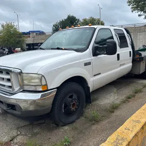 2002 Ford F350 Super Duty Diesel Flatbed Truck (Title in Delay)