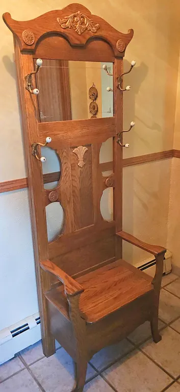 Ornate Oak Hall Tree With Mirror, Hooks, and Lift-Top Storage Bench