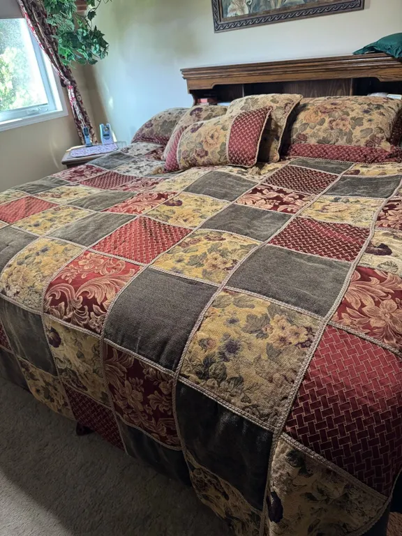 Patchwork King Bedding Set with Decorative Pillows, Curtains, and Framed Floral Art