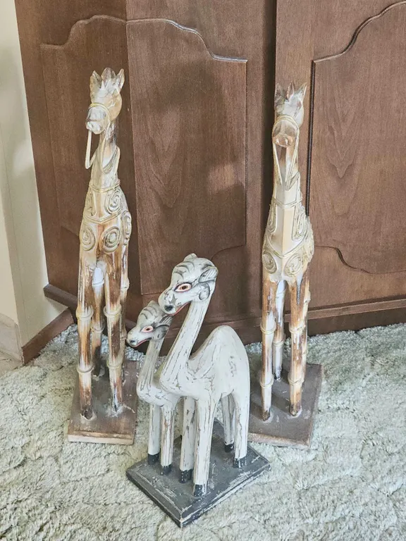 Three Carved Wooden Animal Figures on Bases