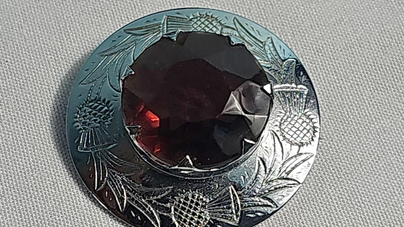 Scottish Silver Tone Brooch with Red Gemstone and Thistle Design