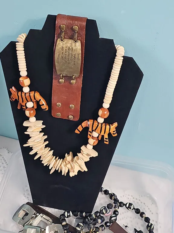 Carved Bone Necklace With Tiger Figures and Decorative Beads