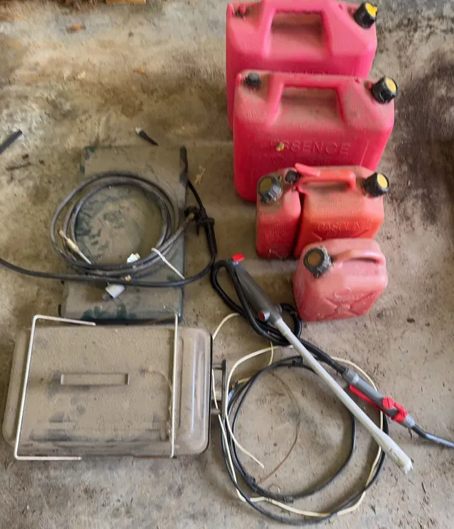 4 Plastic Gas Cans, Fuel Pump and Cook Stoves