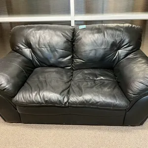 black leather loveseat 66” wide, 36” deep, 36” height