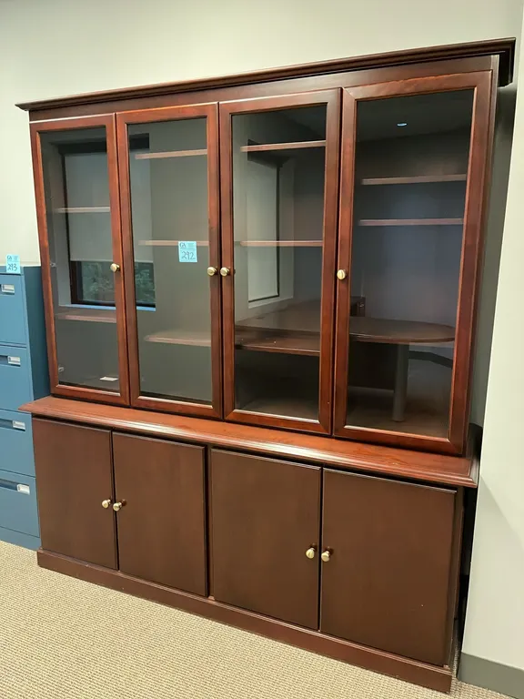Executive Office Cabinet, dark cherry finish, 4 glass upper doors, 4 wooden lower doors, 6’x22”x6.5’