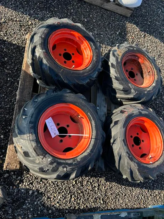 (4) Tractor Tires & Rims (Size: 23x10.50-12 NHS)
