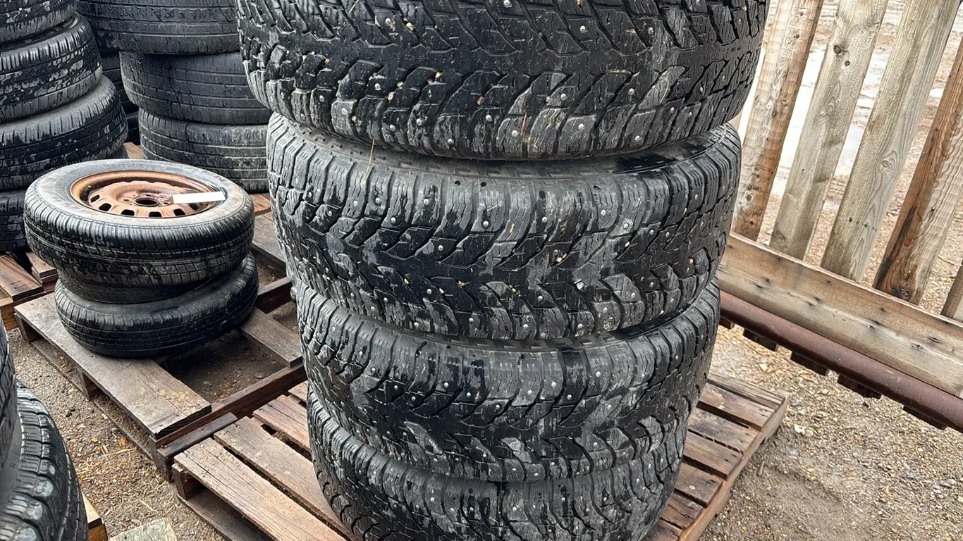 Studded Nokian Hakkepeliita LT3 LT 285/70R17 Tires and Rims from 2005 Dodge Ram 3500 8x6.5" Bolt Pattern