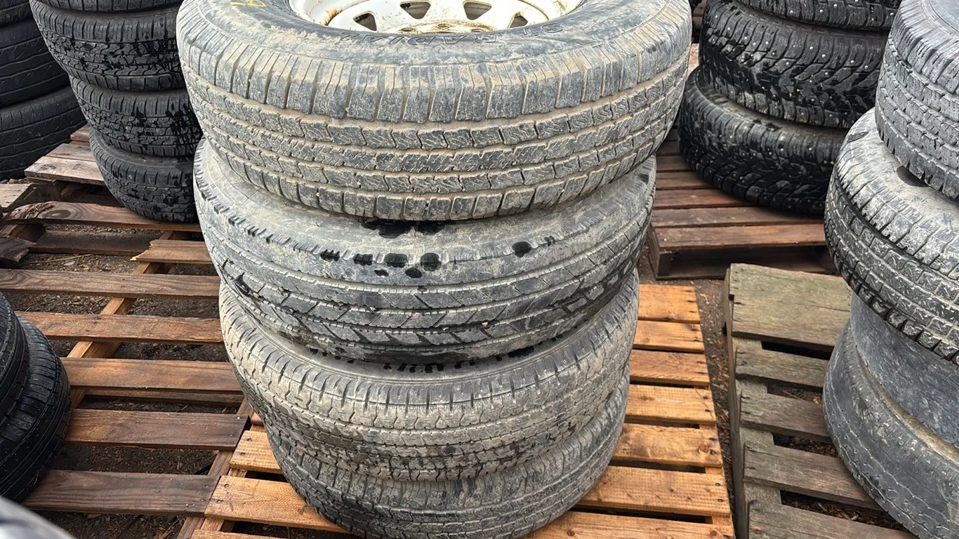 Set of 4 Provider ST235/80R16 tires with 8 Bolt Steel Rims