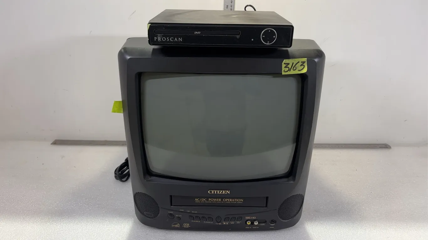 Citizen Analog Portable TV with Built in VCR, Closed Caption Recorder, and Proscan DVD Player approx. 16" x 16" x 16" *Unreserved*
