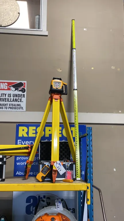 SELF LEVELING ROTARY LASER SET IN TRANSPORT CASE WITH TRIPOD & SURVEYORS RULER