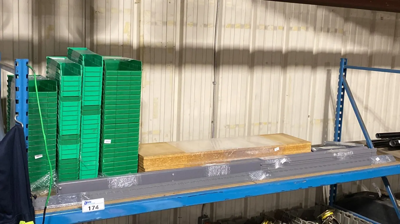 GREY METAL ADJUSTABLE SHELVING UNIT WITH WOOD BOARDS & ASSORTED GREEN PLASTIC STACKABLE PARTS