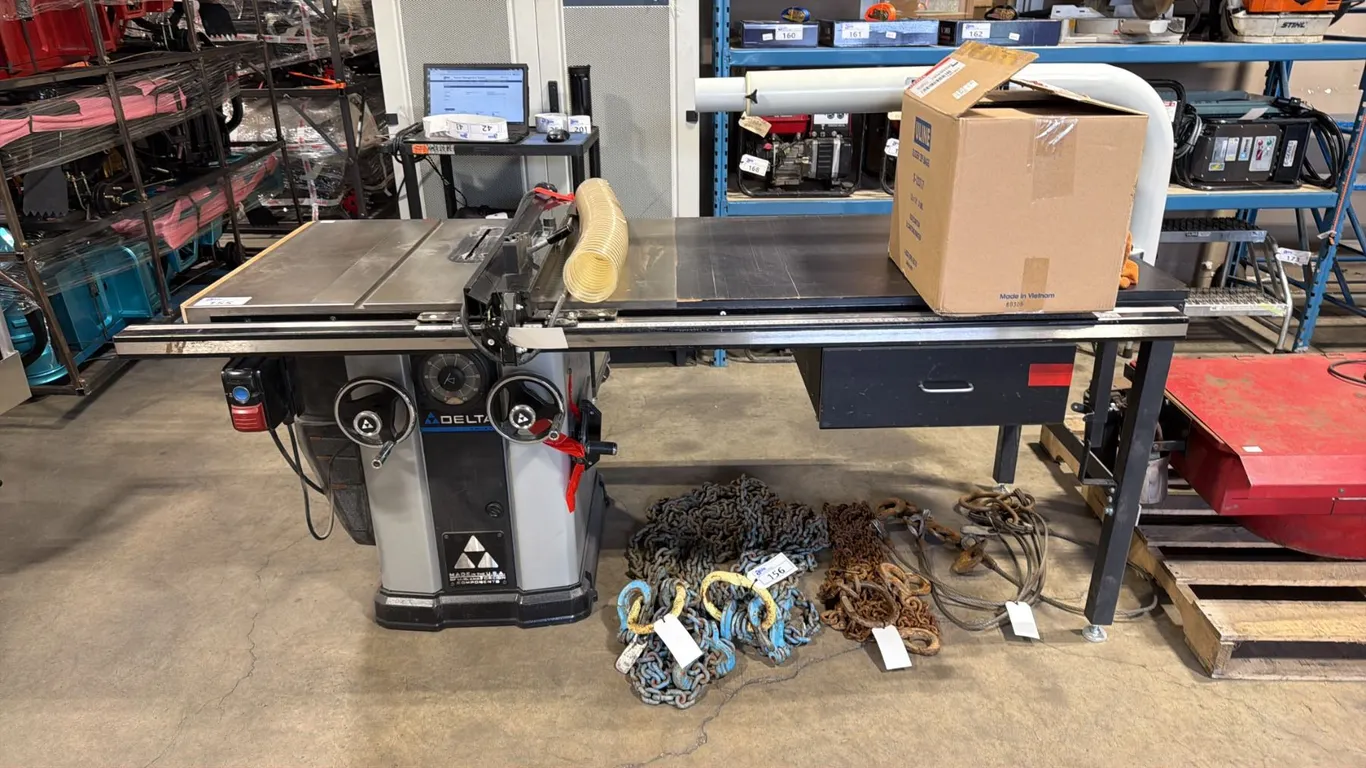 DELTA 10" LEFT TILTING UNISAW WITH WITH COMMERCIAL FENCE SYSTEM & DRAWER FULL OF SAW GUARDS &