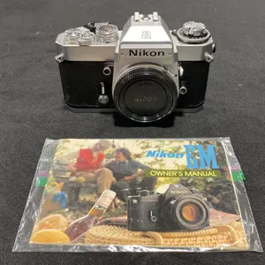 NIKON EM 35MM FILM CAMERA - CHROME BODY *NO LENS*