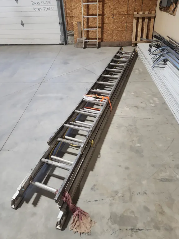 Lot of 2 Extension Ladders (14ft,12ft)