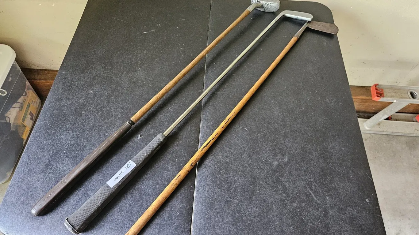 Three vintage putters incl. hickory-shaft Fairview blade