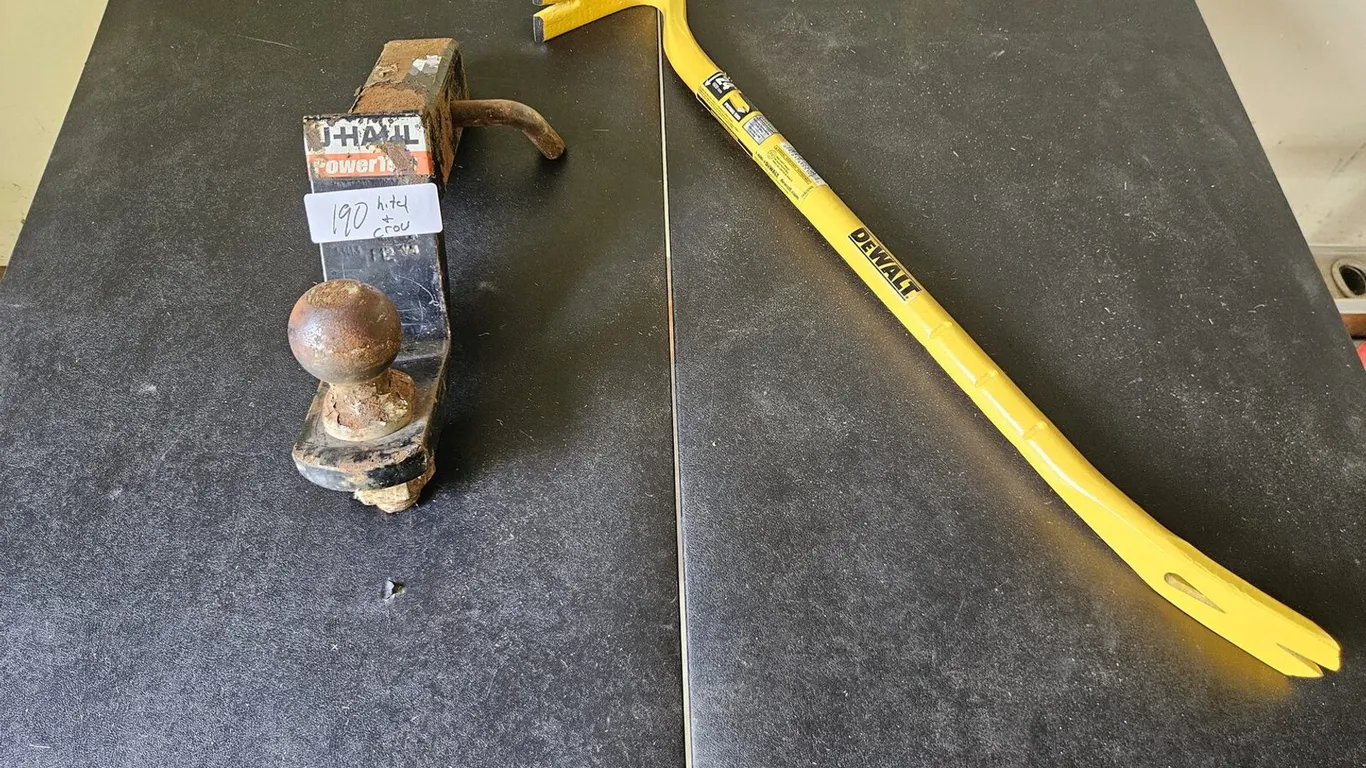 U-Haul PowerTow ball mount and DeWALT 24 in. pry bar
