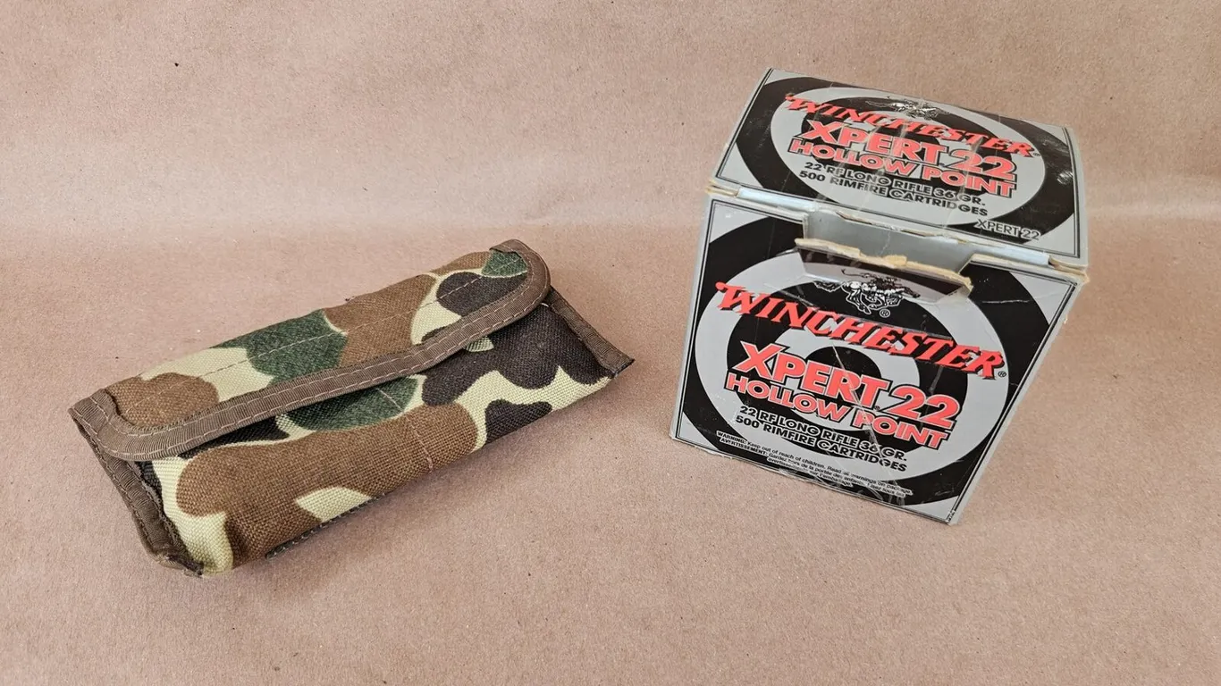 Winchester Xpert 22 LR 36 Gr Partial Box and Camo Ammo Pouch