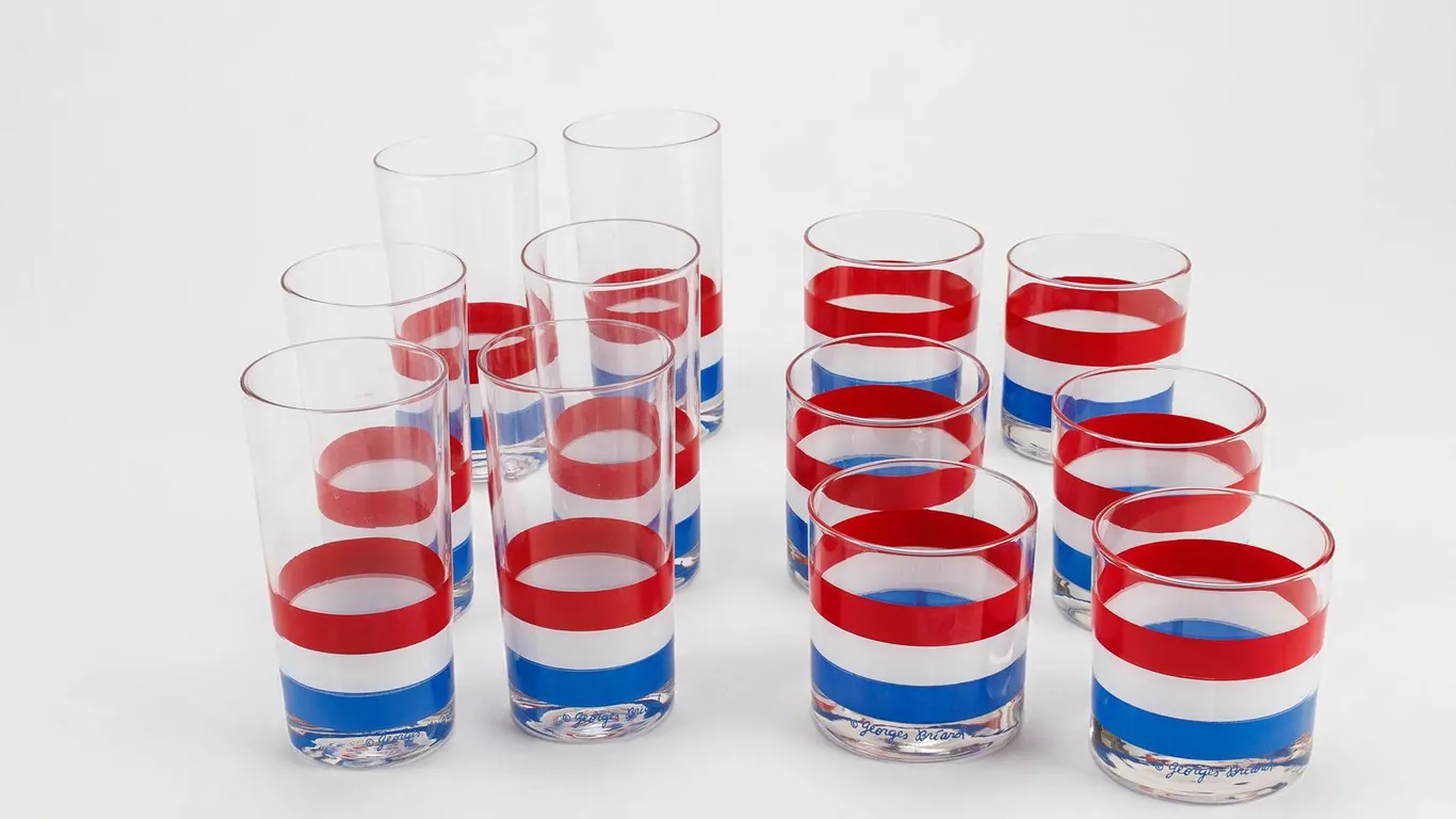 Two Sets of Vintage Georges Briard MCM Glasses in Red, White, and Blue