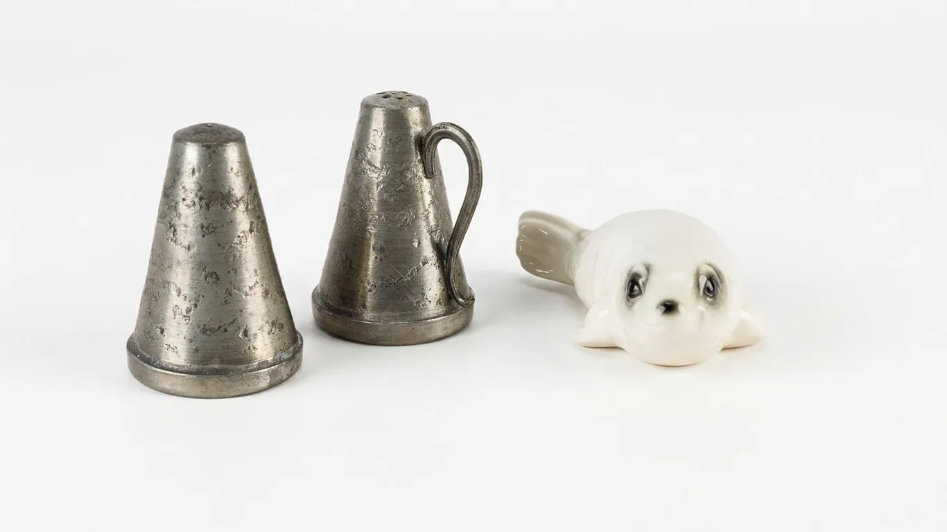 Set of Vintage Skurdal Tinn Salt and Pepper Shakers with Goebel Seal Figurine