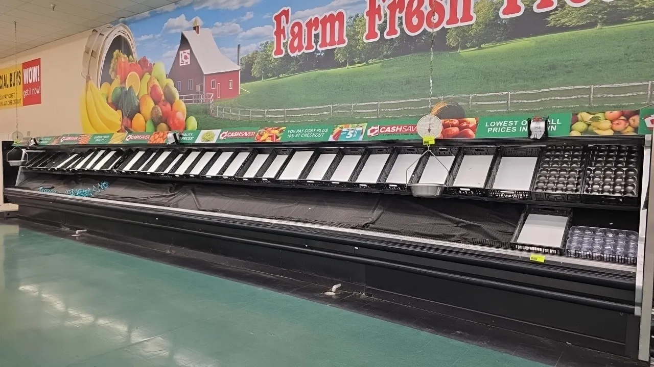 Hussmann multi-deck medium-temp produce display cases. Features open front multi-tier design, angled display shelving, and lower bumper guard. 40'L to