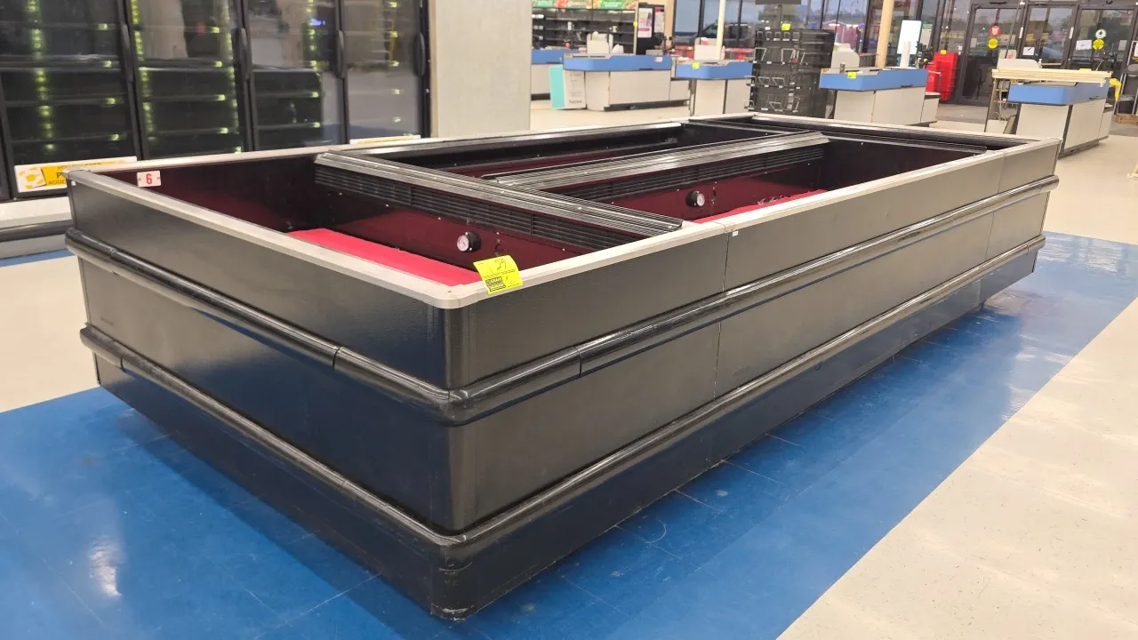 2009 Hussmann FW-8U double-wide frozen food island merchandiser cases. Configured with two end bunkers and an 8'L center section (14'L total). Feature