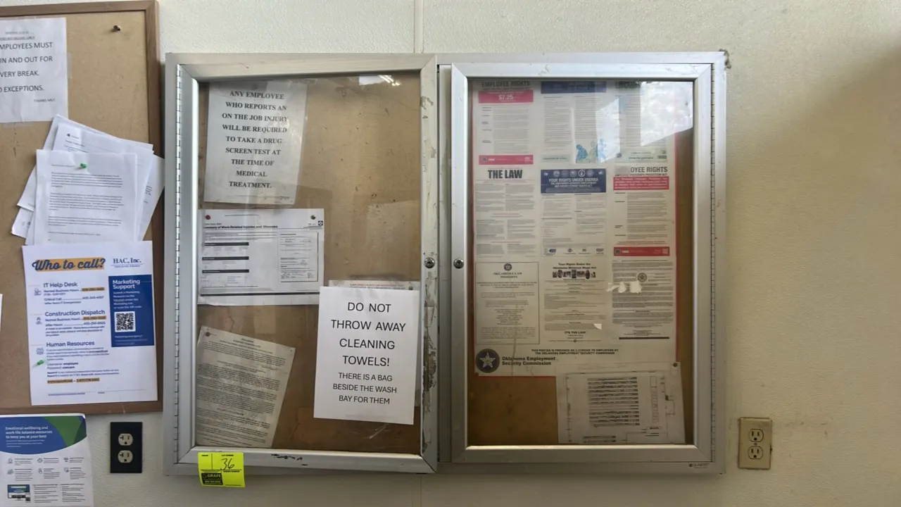 Quartet enclosed cork bulletin board. Features dual hinged locking doors with clear panels, aluminum frame, and natural cork tack surface. 48" x 32".