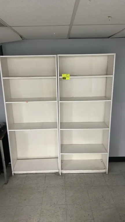 Laminate multi-tier shelving units. Features white laminate construction and adjustable shelving. Dimensions: 30" x 12" each.