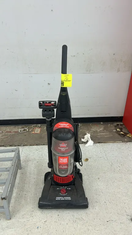 BISSELL PowerForce Helix Turbo bagless upright vacuum. Features bagless dirt cup, TurboBrush attachment, onboard hose, cord wrap, and adjustable floor