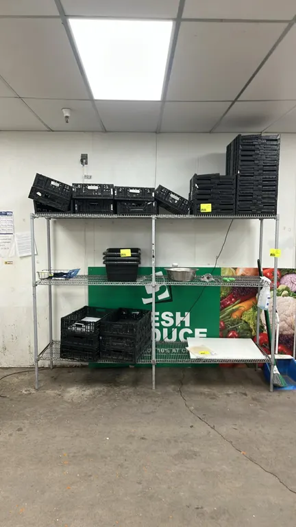 8'L 3-tier metal wire shelving rack. Features 3 tiers of wire shelving and metal upright posts. Dimensions: 8'L x 2'W. Contents not included.