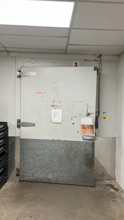 Walk-in cooler package. Includes a 278" x 183" x 108" 2-room cooler with pallet-sized door, lighting, and 2-fan evaporator; and a 270" x 185" x 108" c