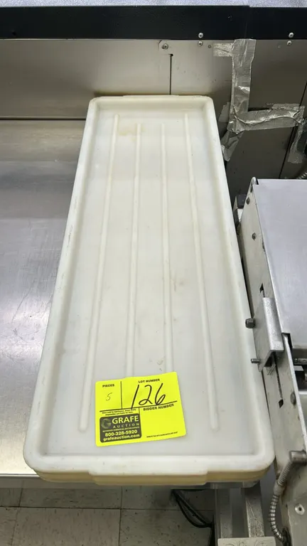Polyethylene display trays. Features molded white construction with a ribbed base and raised rim. 30"L.