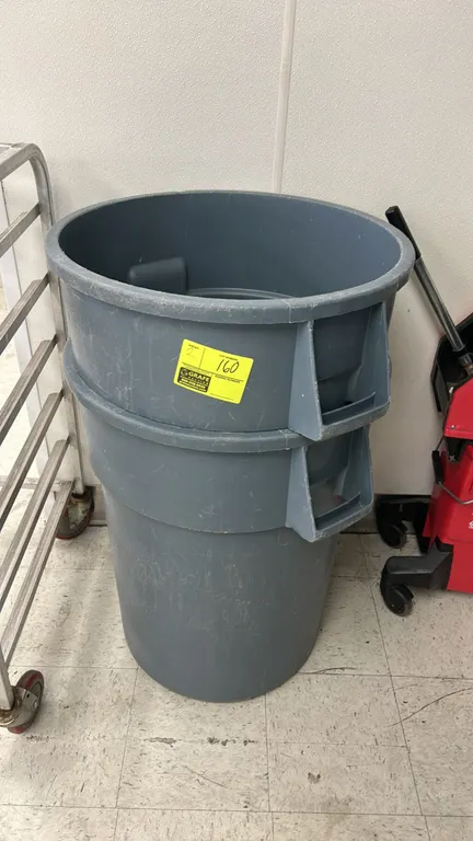 Rubbermaid Commercial Products poly bulk trash bins. Features gray heavy-duty plastic construction, molded integrated side handles, and a round design
