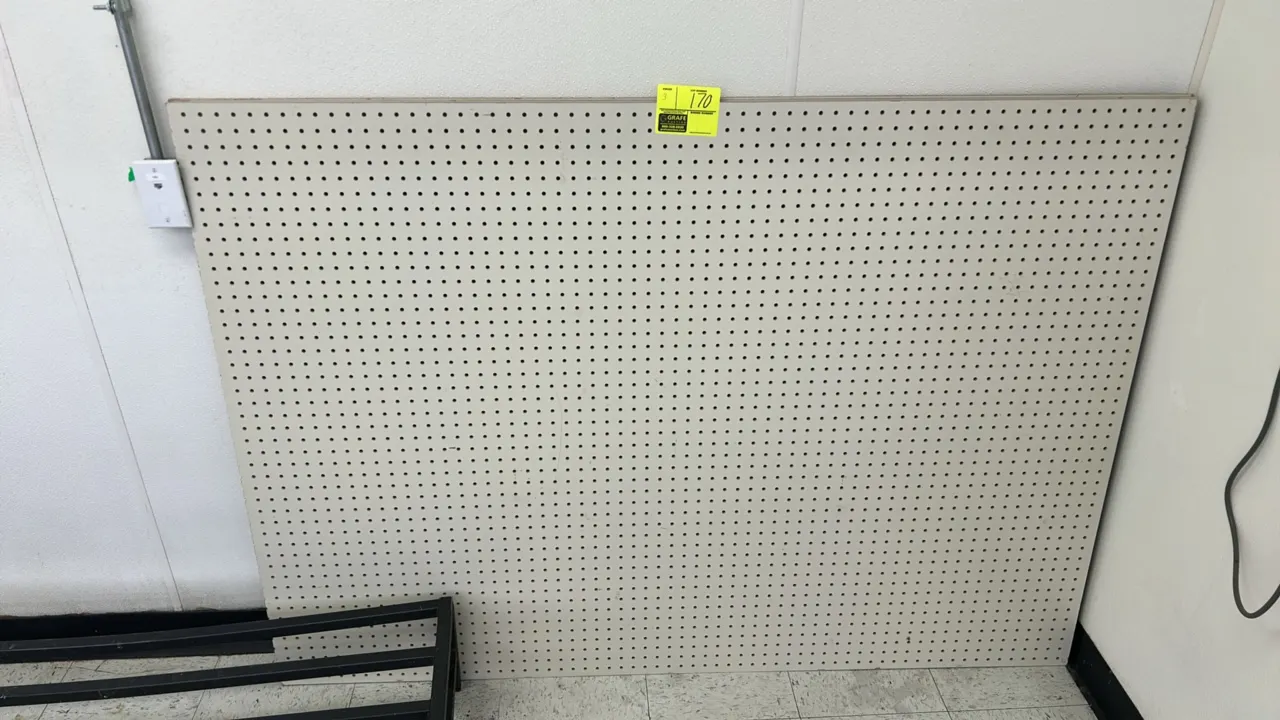 Pegboard panels. Features perforated surface and off-white finish. 64".